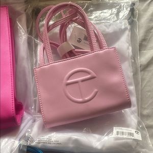 Small bubblegum Telfar bag. Selling bags for college books